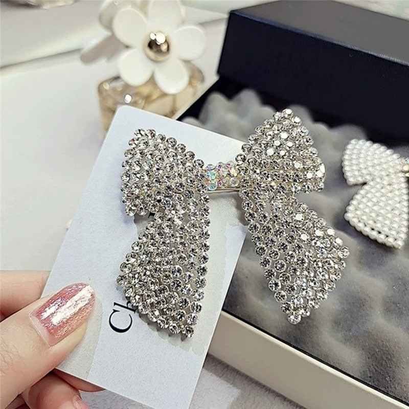 حجر الراين اللؤلؤ القوس مقاطع  - مراجعة Tie Bar Clip وسعره